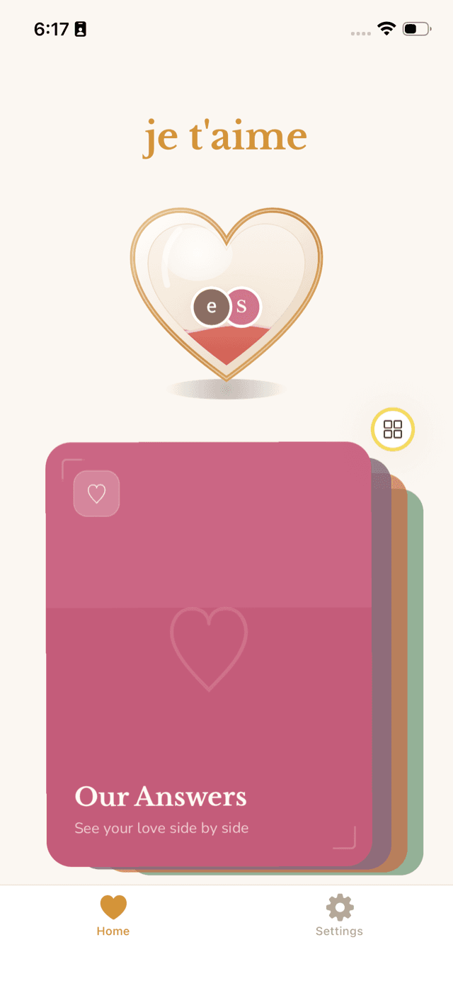 The Je t'aime home screen: the glass Love Tank heart above a deck of room cards